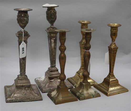 A pair of Sheffield plated candlesticks and two pairs of brass candlesticks (6)